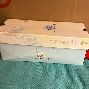 Brown/tan/gold flip flops with gemstone